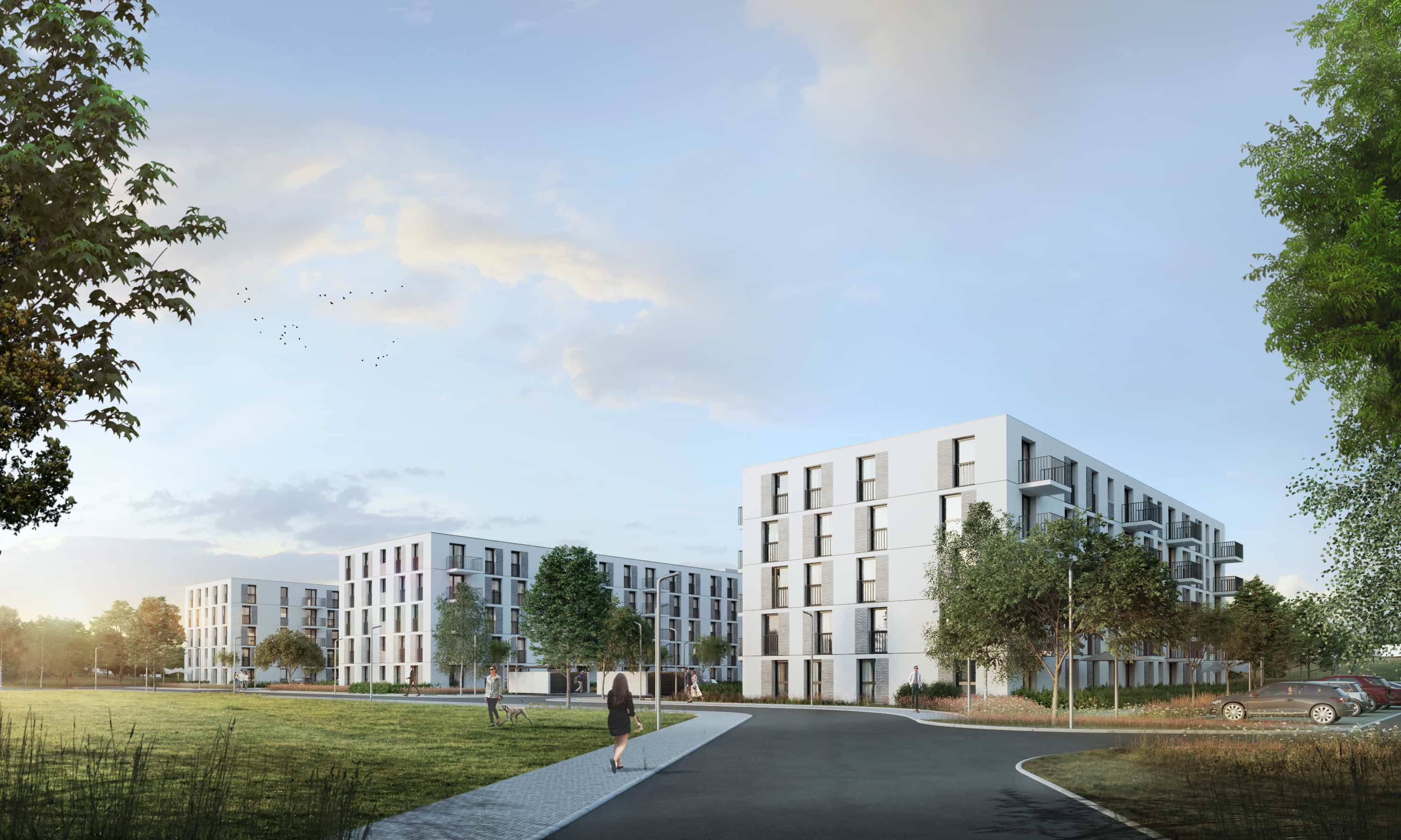 trzy biały budynki stojące obok siebie