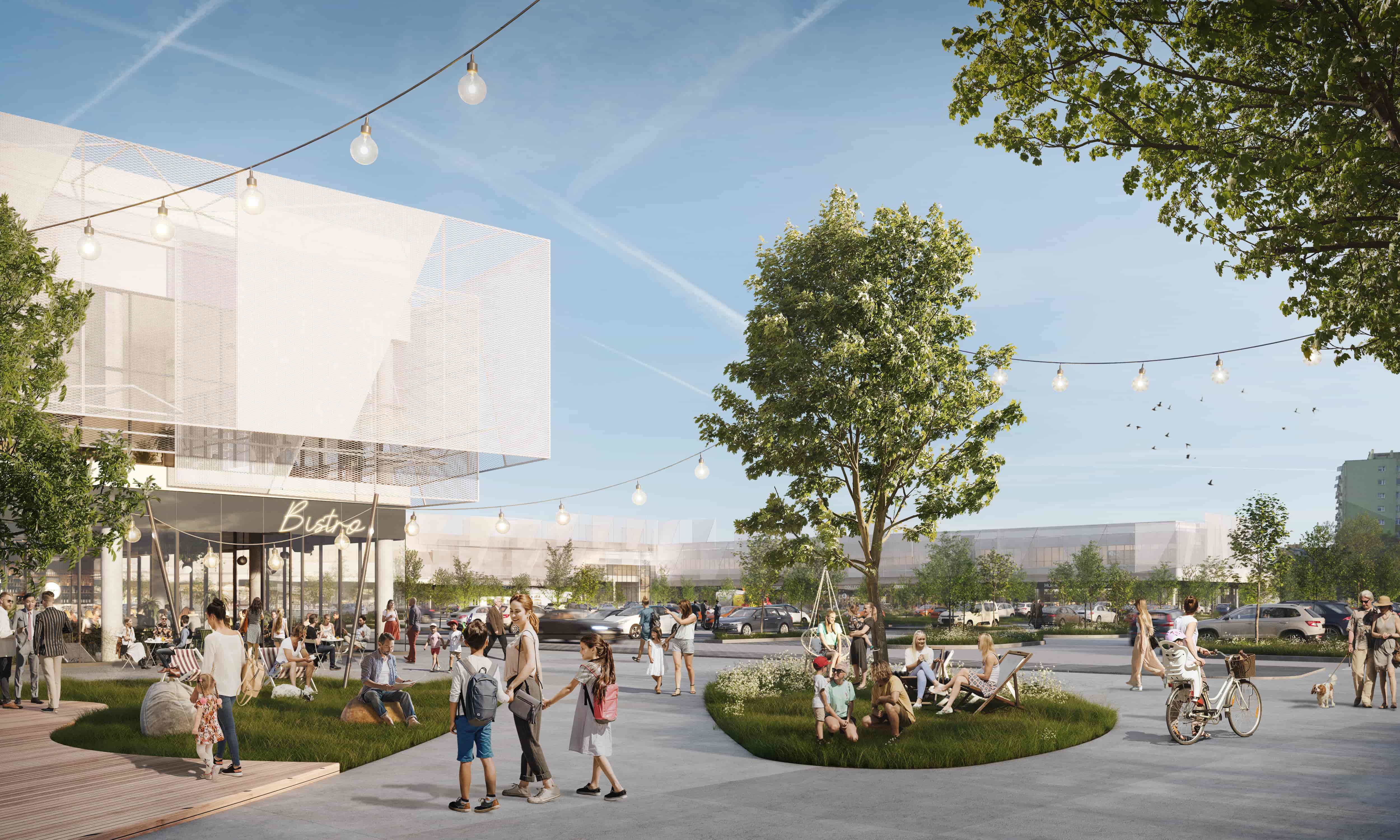 budynek retail parku, zieliony drzewa oraz spacerujące ludzie.
